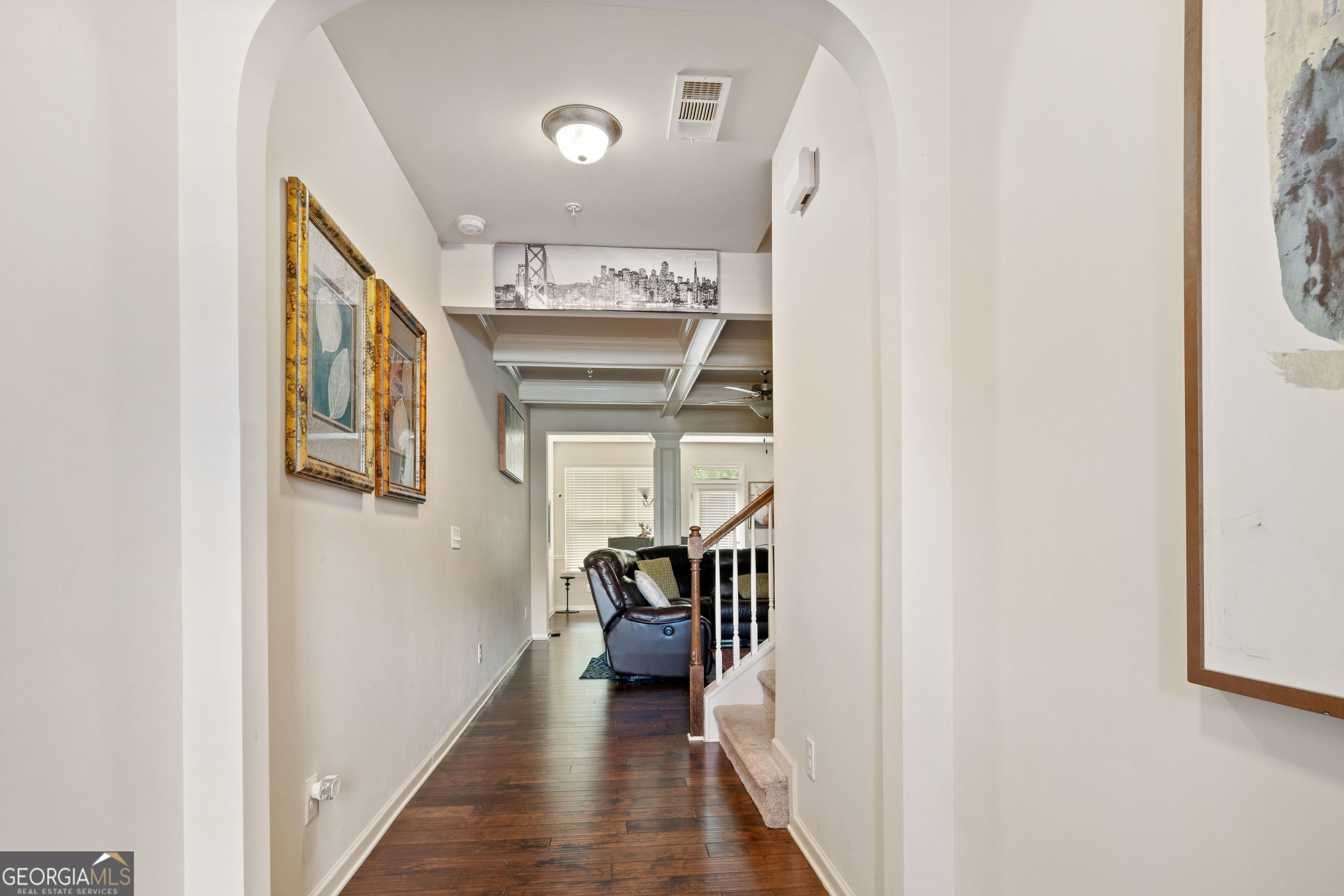 3487 Desoto Road Snellville, GA 30078 - Photo 2 of 13 a view of a hallway with a dining table and chairs
