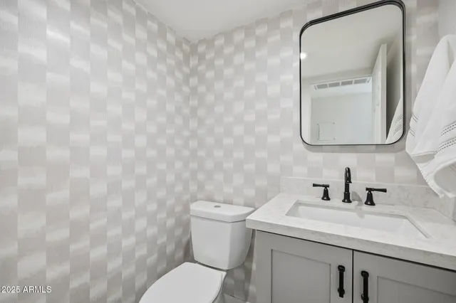 a bathroom with a sink and a toilet