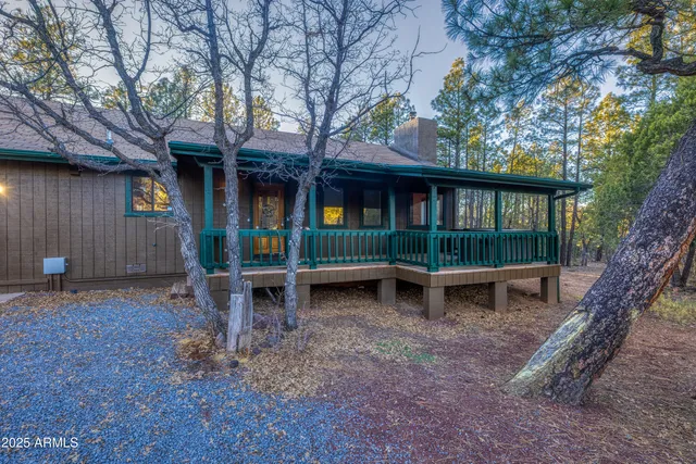 a view of porch with wooden floor
