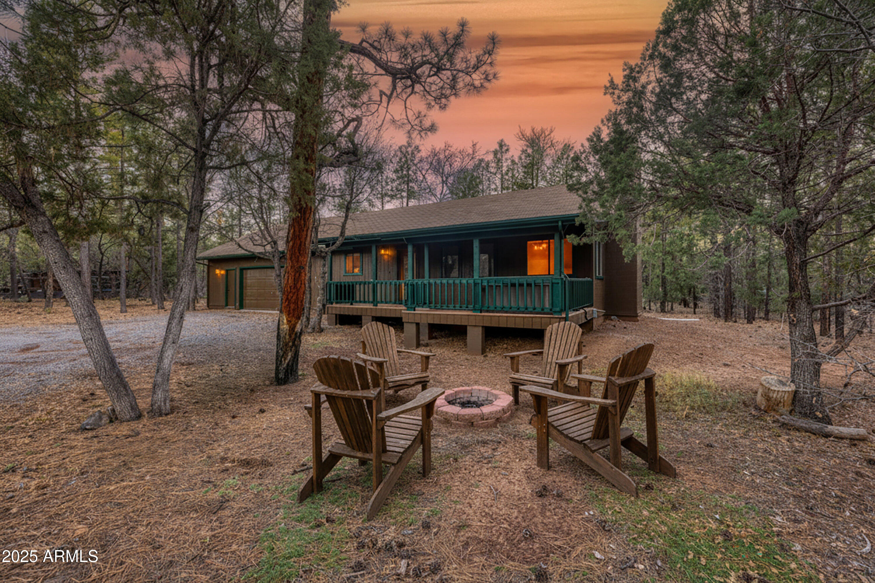 3400 Goodwill Lane Lakeside, AZ 85929 - Photo 2 of 43 a backyard of a house with table and chairs