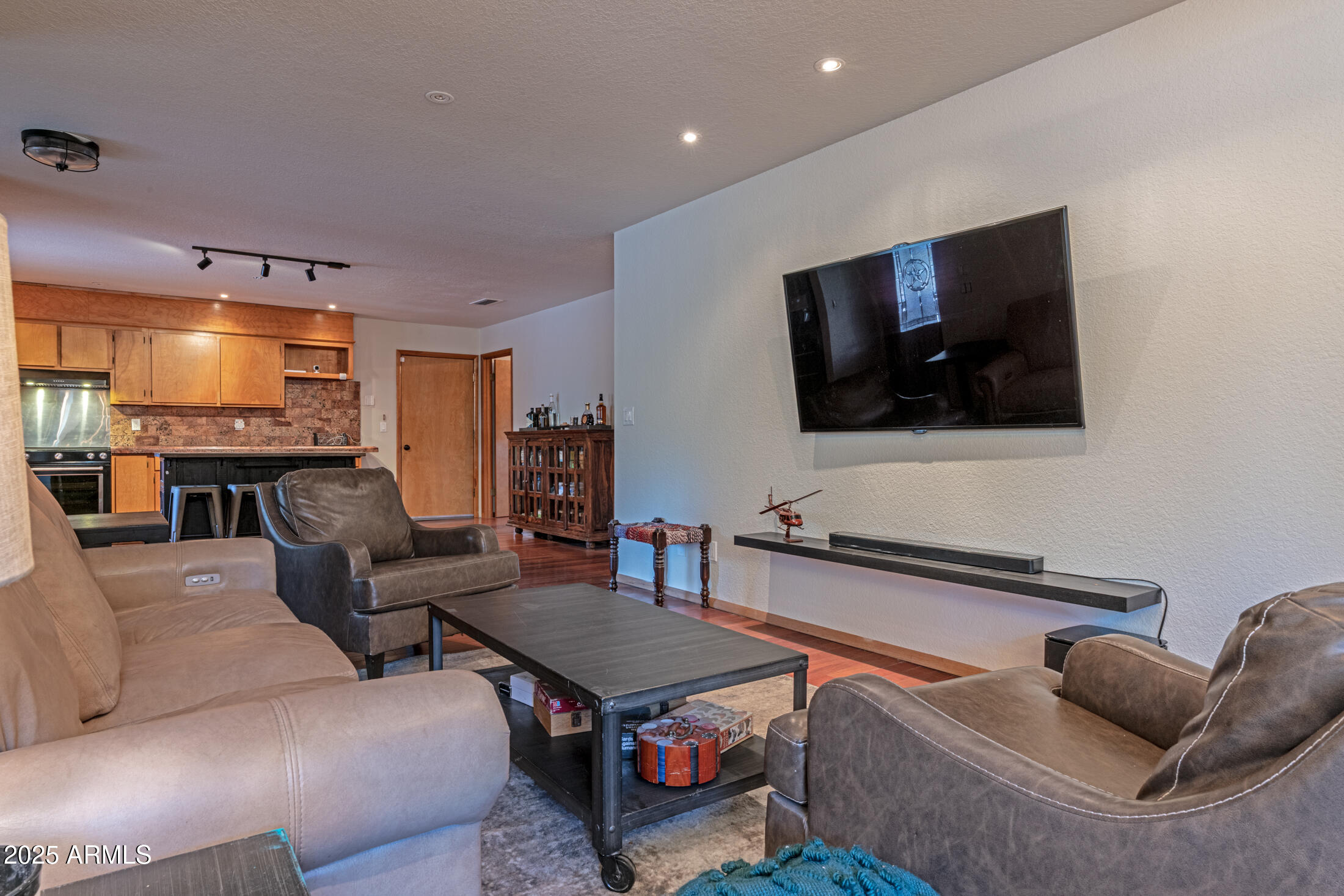 3400 Goodwill Lane Lakeside, AZ 85929 - Photo 24 of 43 a living room with furniture and a flat screen tv