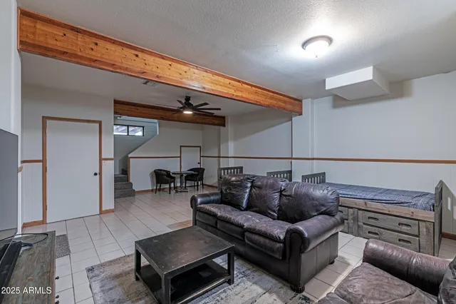a view of a chairs and table on the deck