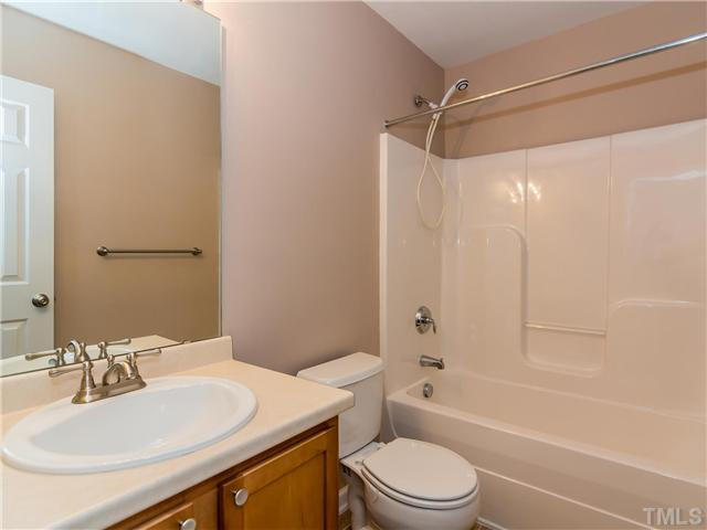 108 Hardaway Point Clayton, NC 27527 - Photo 17 of 21 a bathroom with a sink toilet vanity and shower