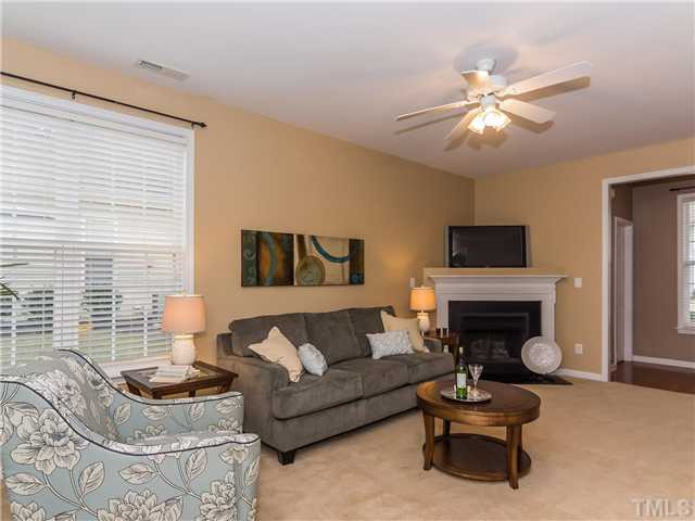 108 Hardaway Point Clayton, NC 27527 - Photo 4 of 21 a living room with furniture and a wooden floor