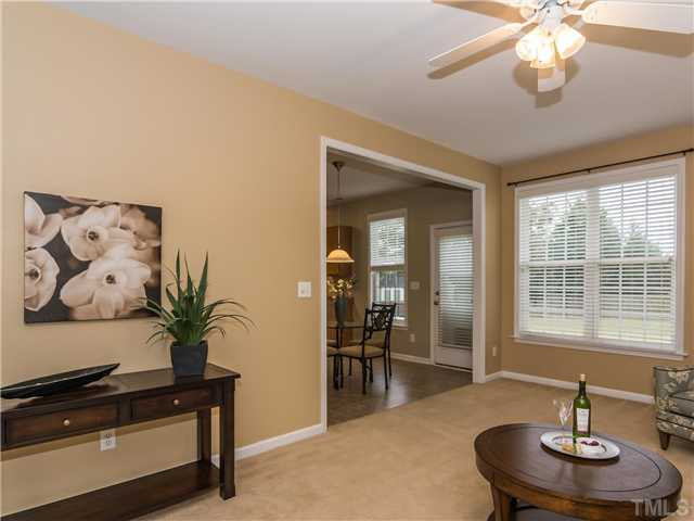 108 Hardaway Point Clayton, NC 27527 - Photo 6 of 21 a view of a livingroom with furniture and a chandelier