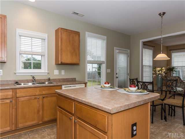 108 Hardaway Point Clayton, NC 27527 - Photo 9 of 21 a kitchen with a sink and cabinets