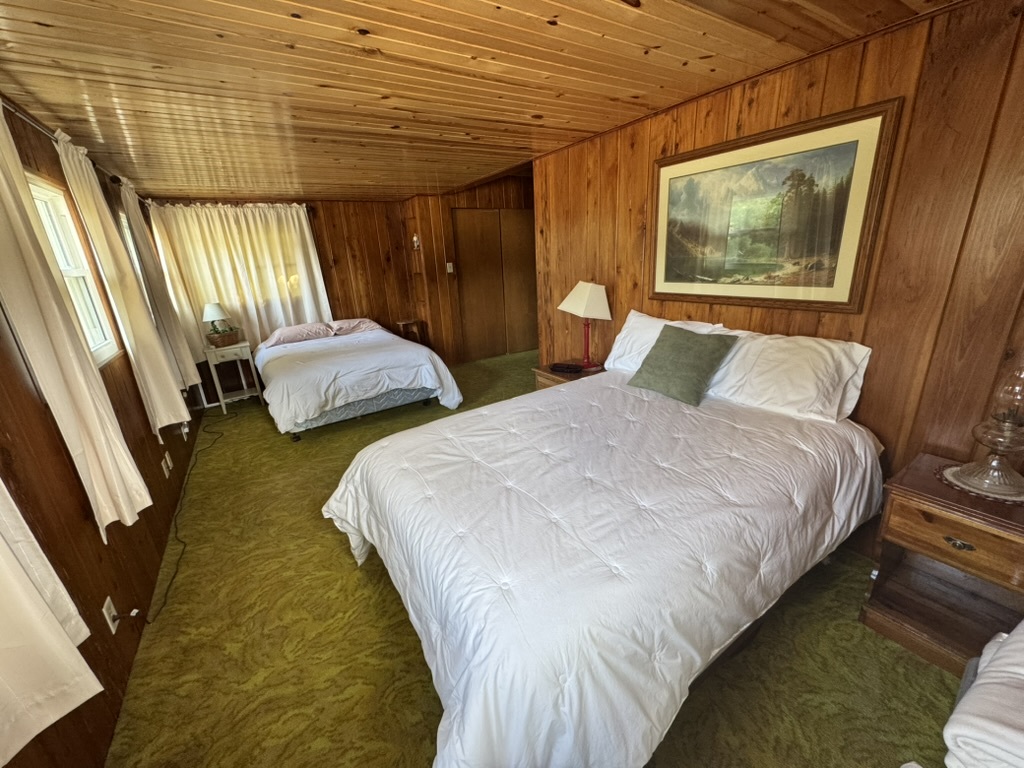 401 West 10th Street Sterling, IL 61081 - Photo 32 of 35 a bedroom with double bed and a window
