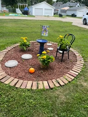 a view of a swimming pool and lounge chairs in back yard