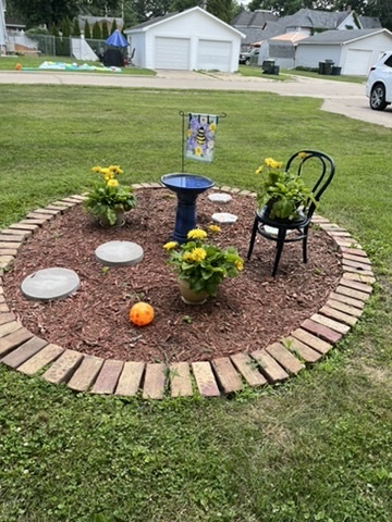 401 West 10th Street Sterling, IL 61081 - Photo 5 of 35 a view of a swimming pool and lounge chairs in back yard
