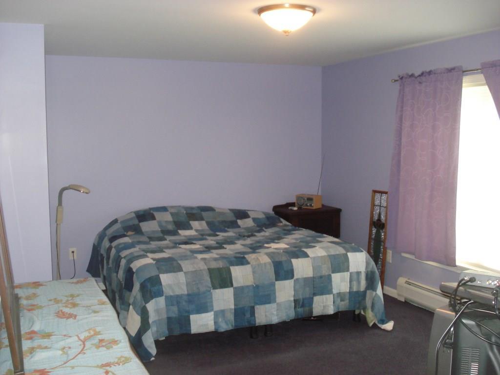 9 Souder Station Road Winterport, ME 04496 - Photo 13 of 23 Master Bedroom