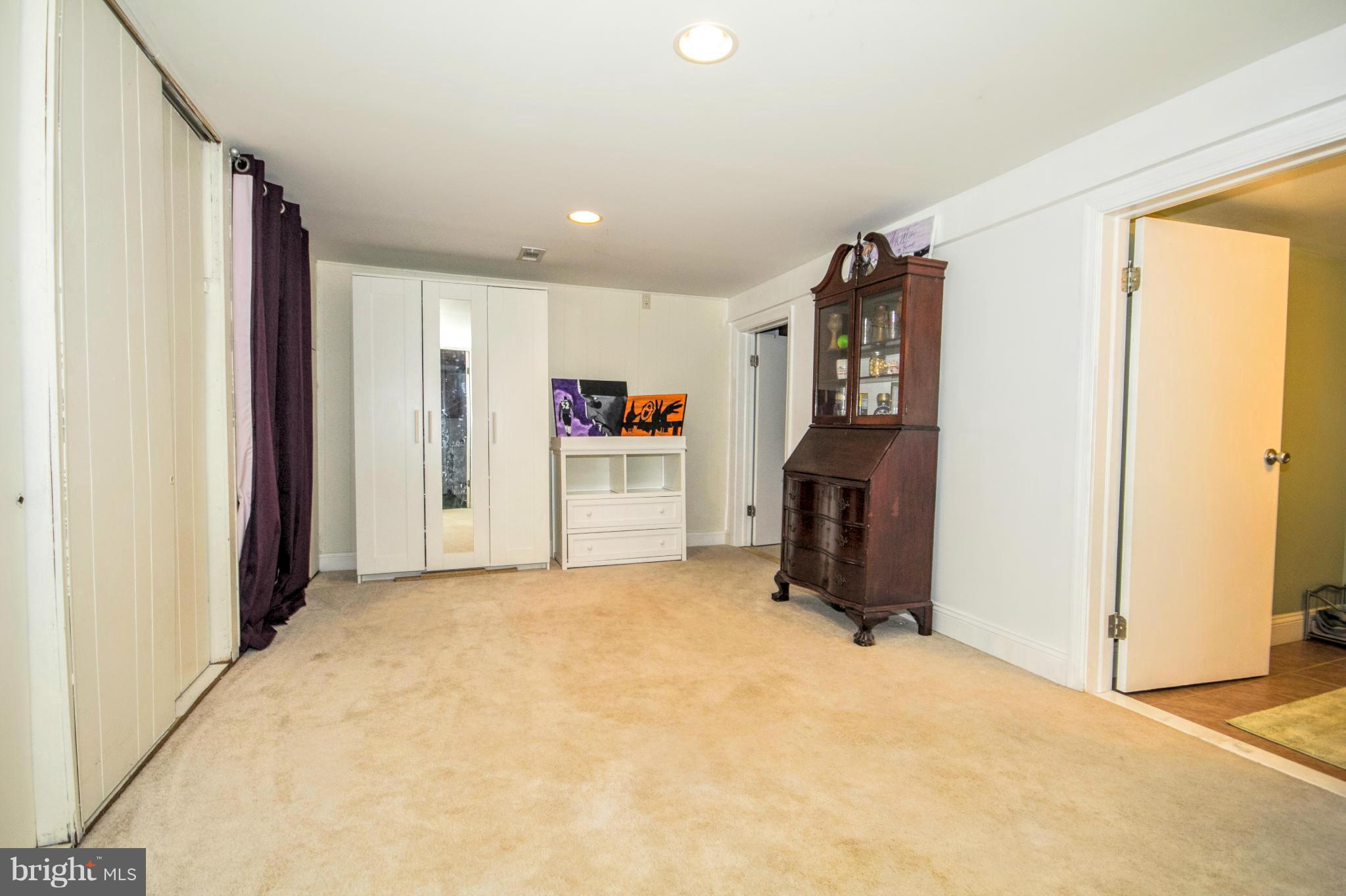 8109 Conduit Road Baltimore, MD 21234 - Photo 5 of 26 a view of livingroom with furniture and a refrigerator