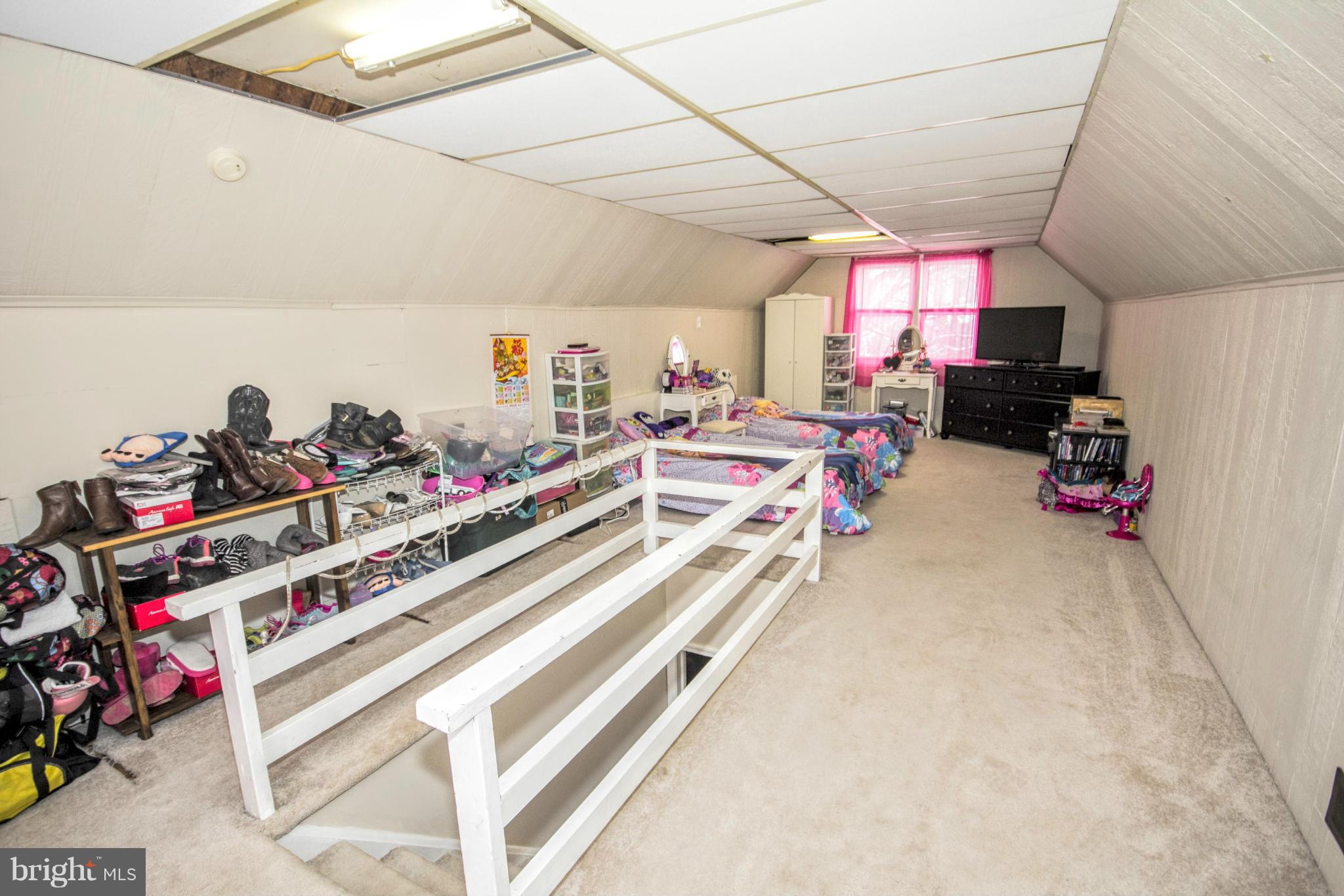 8109 Conduit Road Baltimore, MD 21234 - Photo 7 of 26 a storage room with lots of stuff and toys