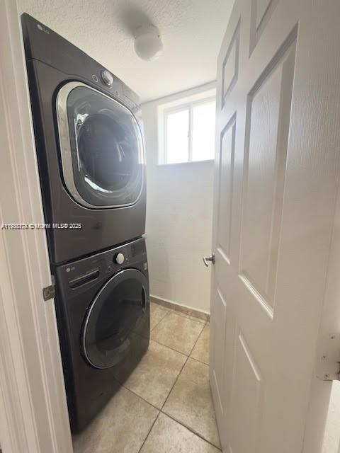 7250 Northwest 174th Terrace, Unit 102 Hialeah, FL 33015 - Photo 17 of 37 a utility room with dryer and washer