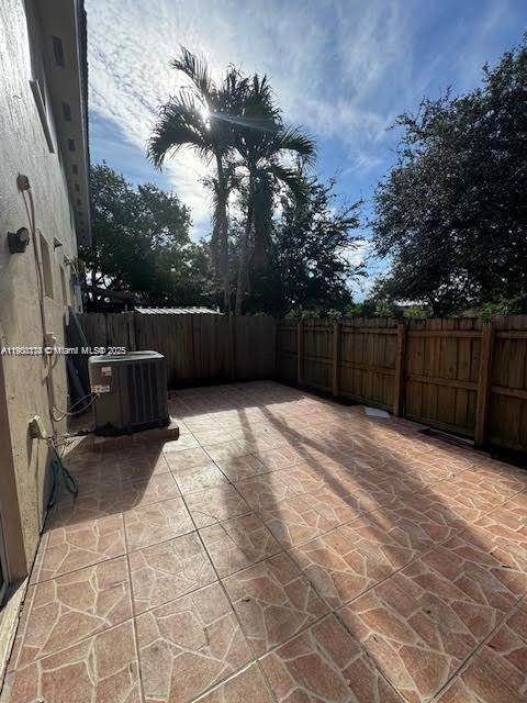 7250 Northwest 174th Terrace, Unit 102 Hialeah, FL 33015 - Photo 20 of 37 a view of backyard with trampoline