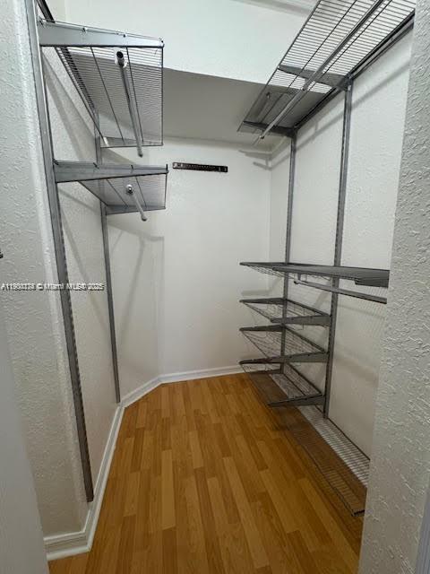 7250 Northwest 174th Terrace, Unit 102 Hialeah, FL 33015 - Photo 31 of 37 a view of a room with racks on the wall