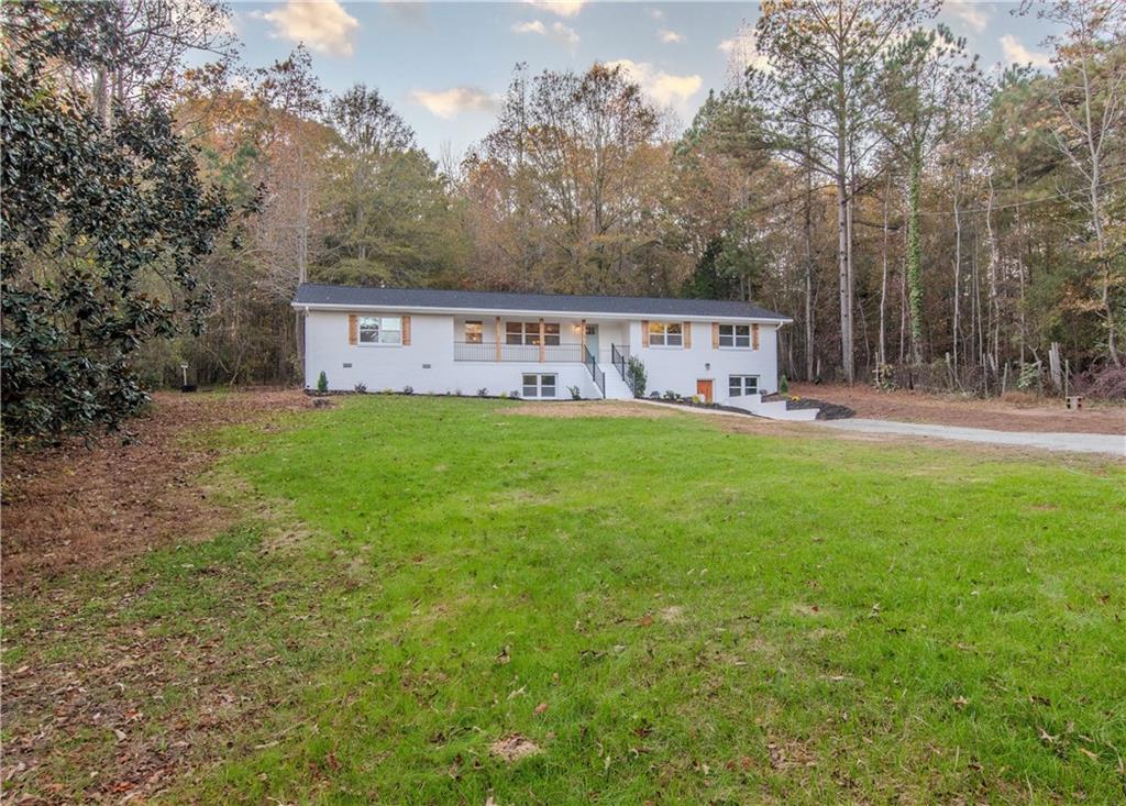 6575 Jenkins Road Fairburn, GA 30213 - Photo 1 of 1 a view of an outdoor space and yard