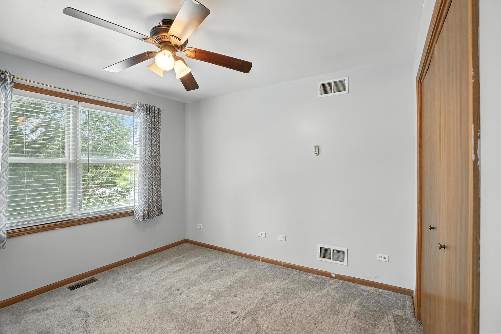 1665 Fox Hound Trail Beecher, IL 60401 - Photo 21 of 34 a view of an empty room with a window