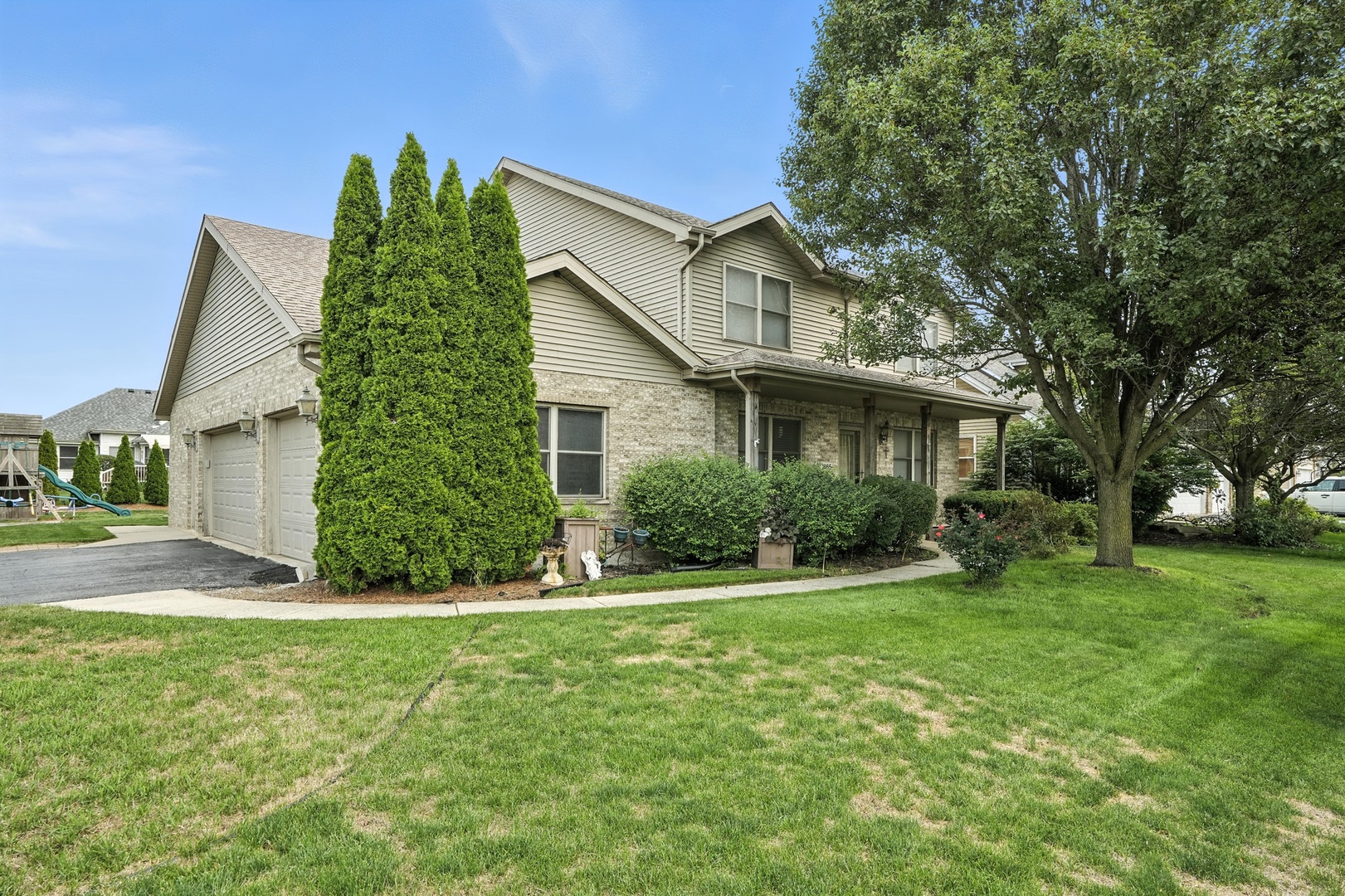 1665 Fox Hound Trail Beecher, IL 60401 - Photo 25 of 34 a front view of house with yard and green space