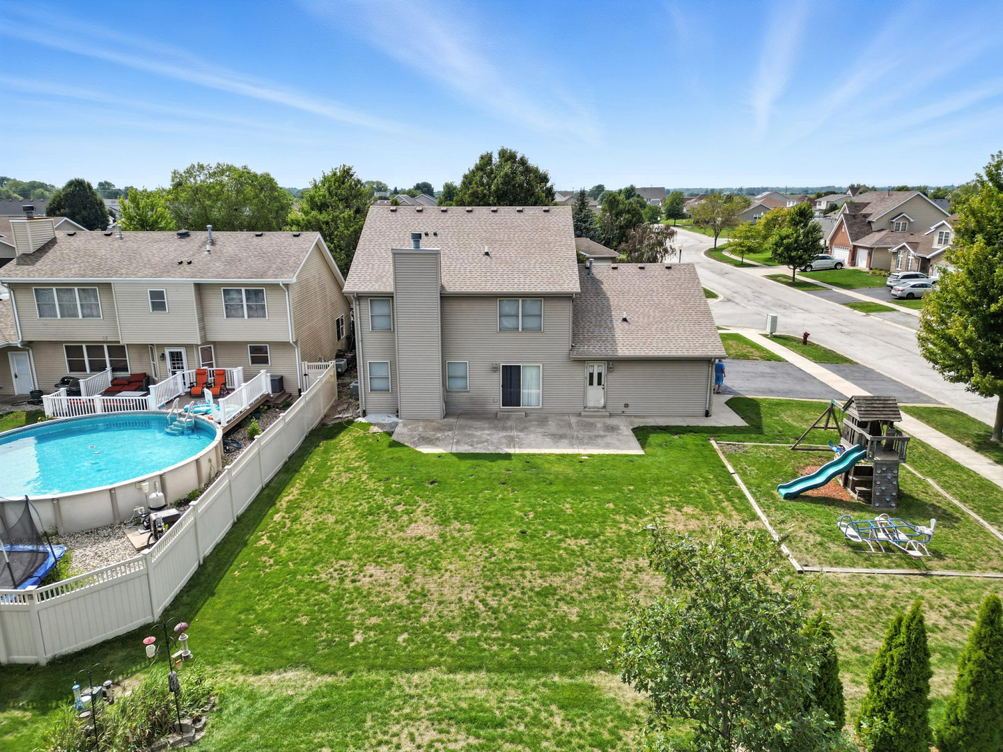 1665 Fox Hound Trail Beecher, IL 60401 - Photo 30 of 34 an aerial view of residential houses with outdoor space and trees