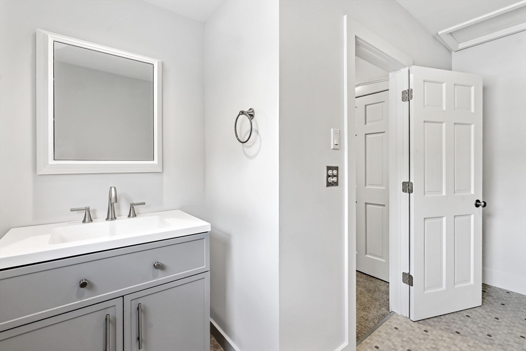 58 Front Street Northampton, MA 01053 - Photo 29 of 42 a bathroom with a sink and a mirror