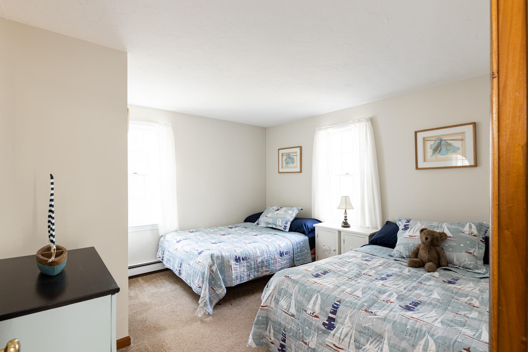 61 Edgewater Road Mashpee, MA 02649 - Photo 22 of 45 a bedroom with two beds and a couch
