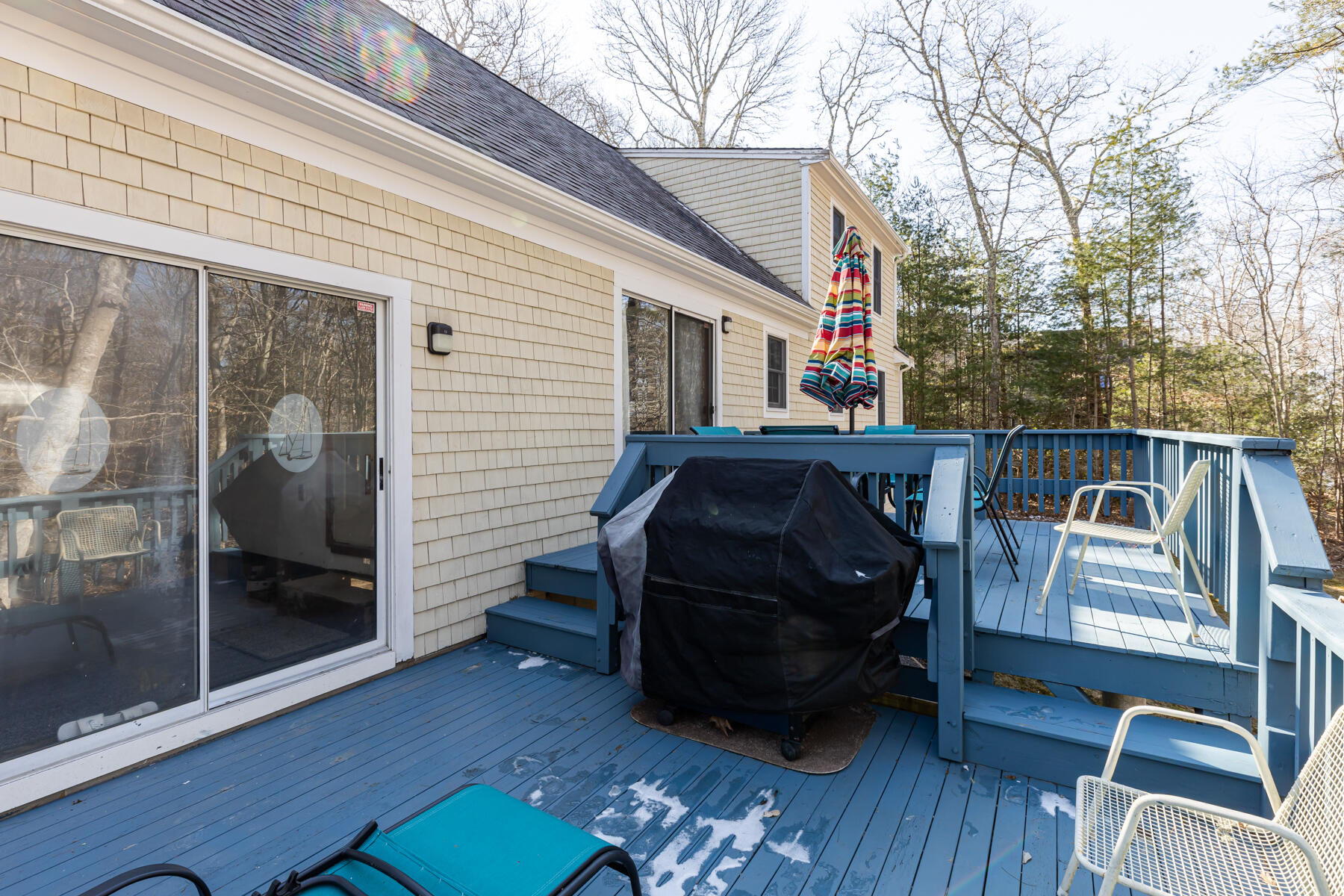 61 Edgewater Road Mashpee, MA 02649 - Photo 35 of 45 a view of a deck with couches and wooden floor