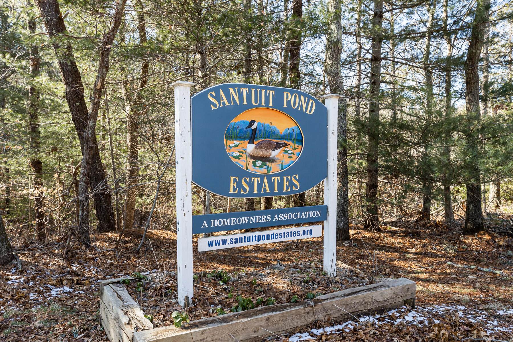 61 Edgewater Road Mashpee, MA 02649 - Photo 5 of 45 a sign that is on a pole