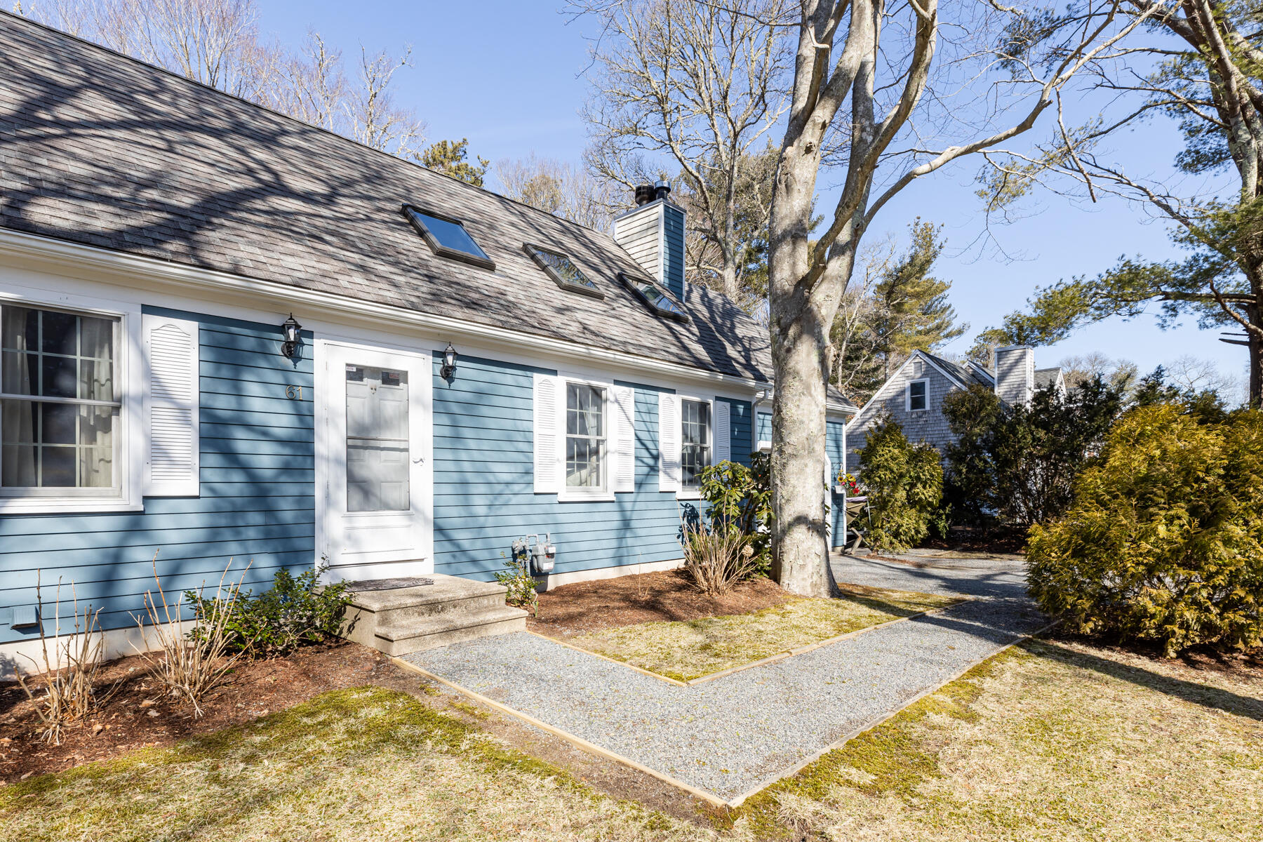 61 Edgewater Road Mashpee, MA 02649 - Photo 7 of 45 a view of a house with snow on the yard