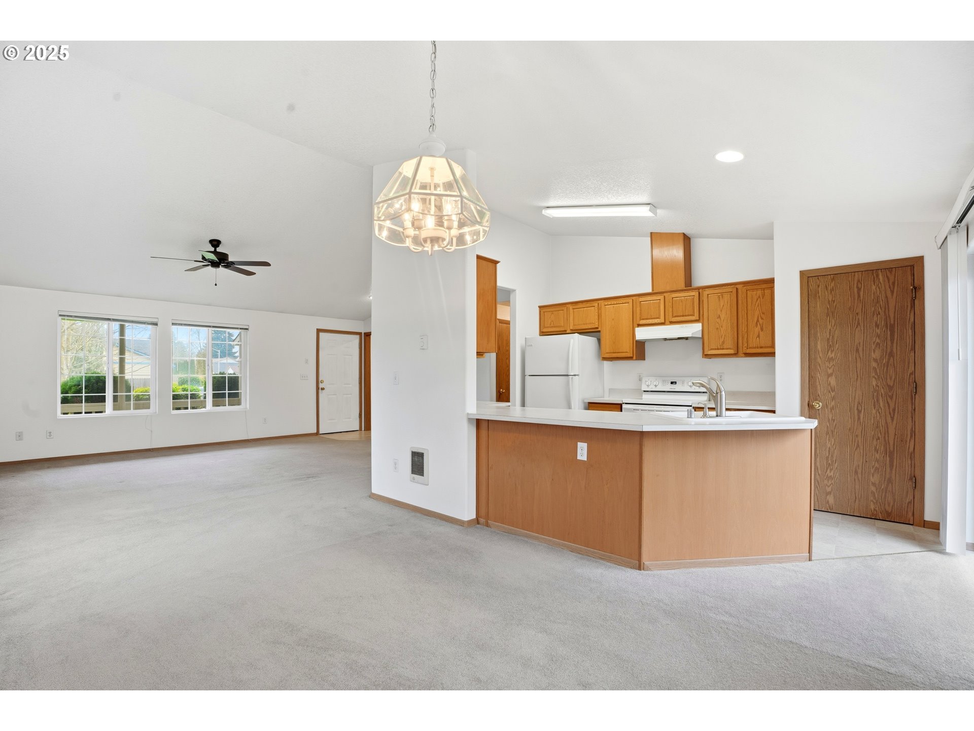 513 Southeast Clark Avenue Battle Ground, WA 98604 - Photo 12 of 30 a view of kitchen with stainless steel appliances granite countertop cabinets and a counter top