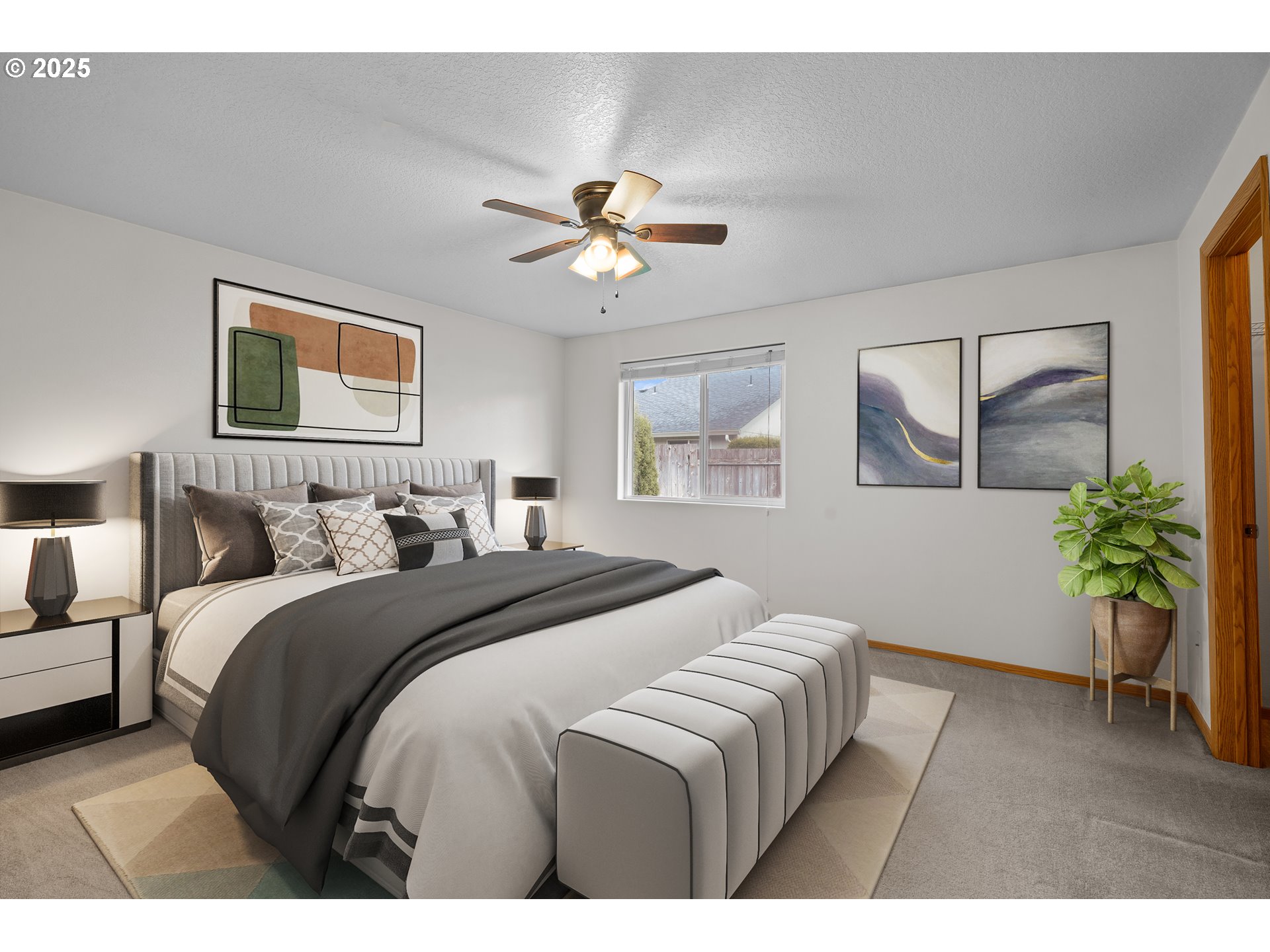 513 Southeast Clark Avenue Battle Ground, WA 98604 - Photo 15 of 30 a bedroom with a bed and a chandelier