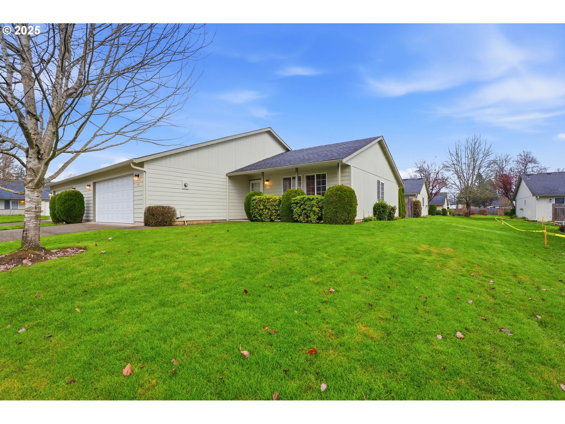 513 Southeast Clark Avenue Battle Ground, WA 98604 - Photo 2 of 30 a view of a house with a yard