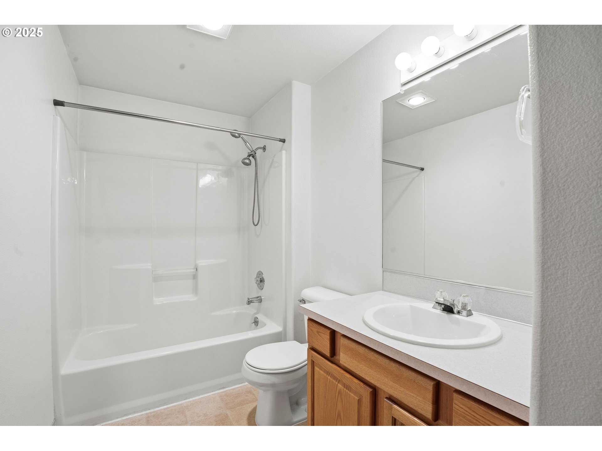 513 Southeast Clark Avenue Battle Ground, WA 98604 - Photo 24 of 30 a bathroom with a sink toilet a shower and a bathtub