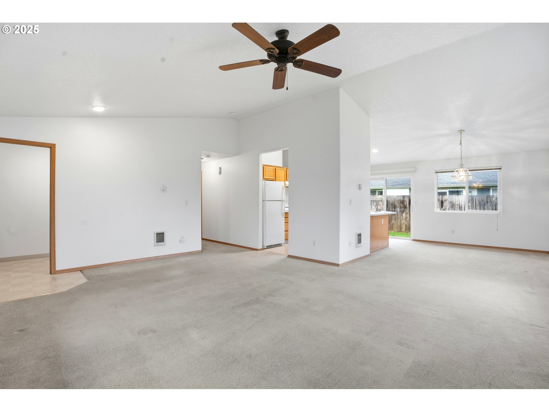 513 Southeast Clark Avenue Battle Ground, WA 98604 - Photo 6 of 30 a view of a livingroom with a ceiling fan and window