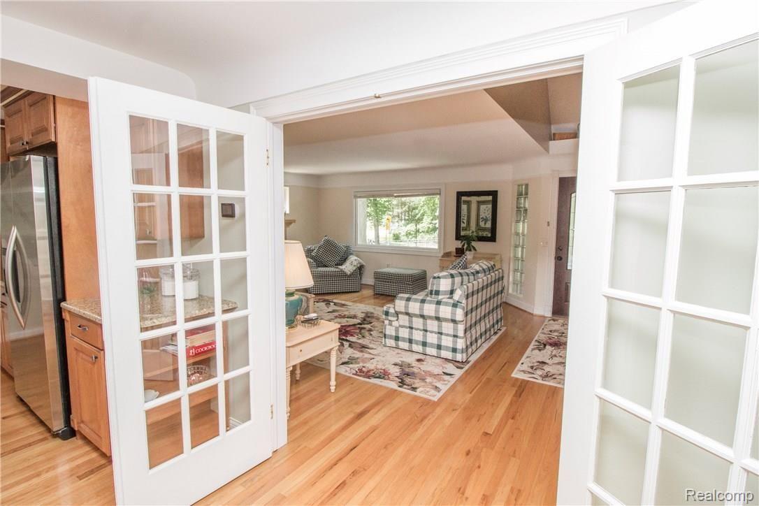 6108 Pine Knob Road Clarkston, MI 48348 - Photo 19 of 48 Through the Charming French doors is your Gorgeous Kitchen, Dining, and Great Room