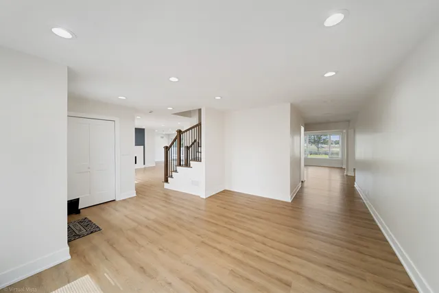 a view of a livingroom with wooden floor