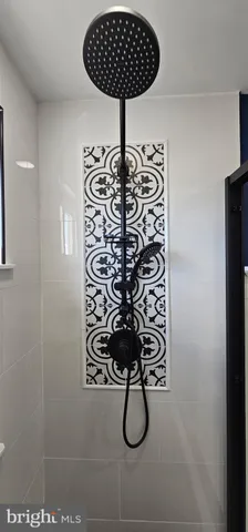 a view of a room with wooden walls