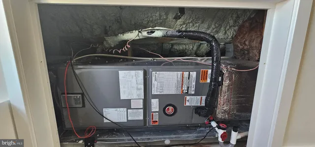 a bathroom with a sink toilet and mirror