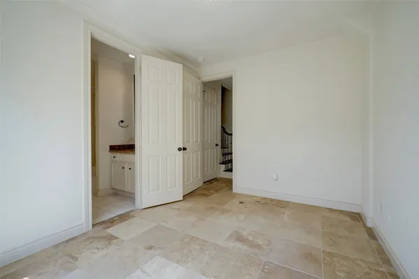 an empty room with a bathroom