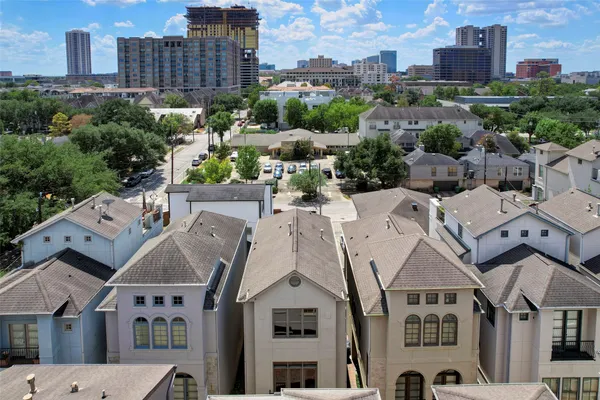 a view of a city with tall buildings