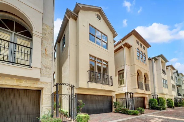 a front view of a building with a street