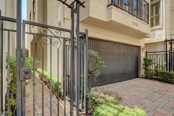 a view of a house with a street