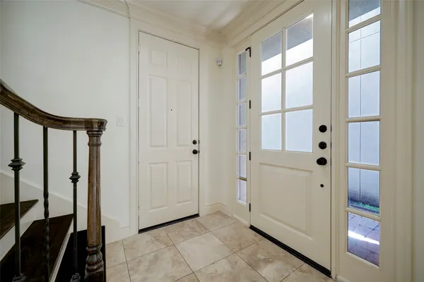 wooden floor with white walls