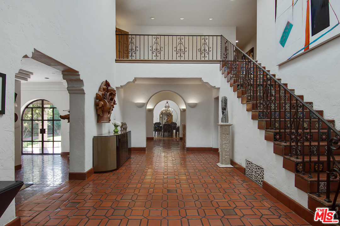 701 North Alpine Drive Beverly Hills, CA 90210 - Photo 2 of 22 a view of livingroom with furniture entryway and wooden floor
