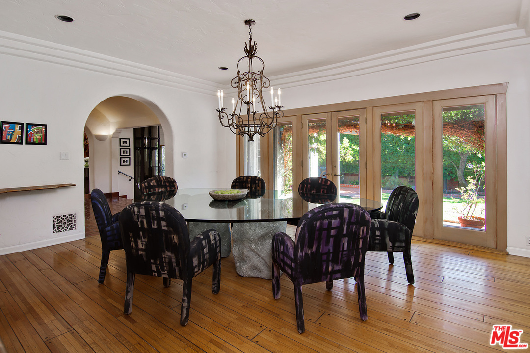 701 North Alpine Drive Beverly Hills, CA 90210 - Photo 9 of 22 a view of a dining room with furniture window and wooden floor