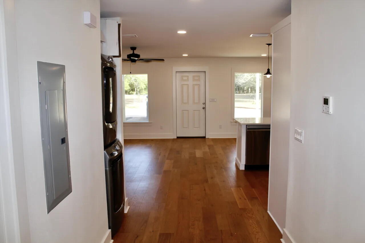 54 Davis Street DeFuniak Springs, FL 32435 - Photo 12 of 14 a view of empty room with wooden floor and window