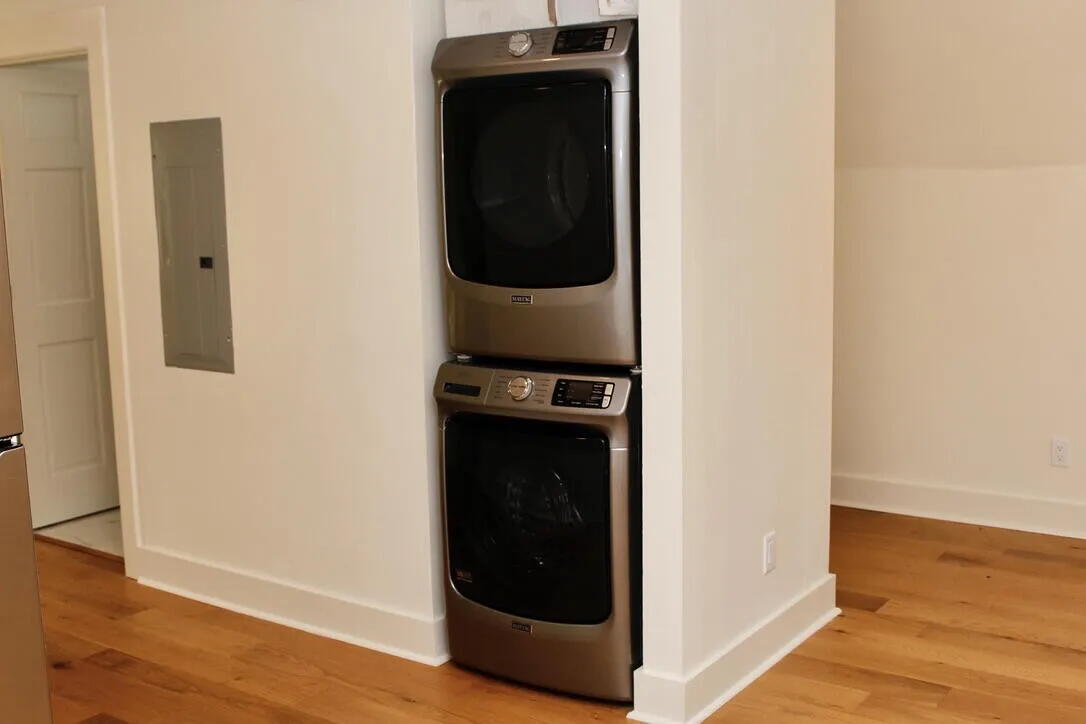 54 Davis Street DeFuniak Springs, FL 32435 - Photo 9 of 14 a view of a hallway with wooden floor and closet