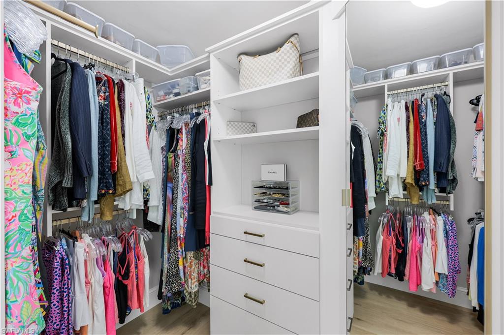 9115 Strada Place, Unit 5502 Naples, FL 34108 - Photo 20 of 48 Spacious walk-in closet with built-in cabinets