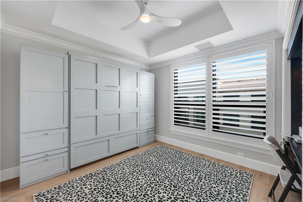 9115 Strada Place, Unit 5502 Naples, FL 34108 - Photo 23 of 48 Second Bedroom /office with a Murphy- Bed