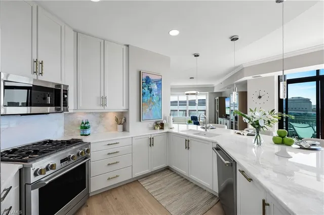 a view of a living room and balcony