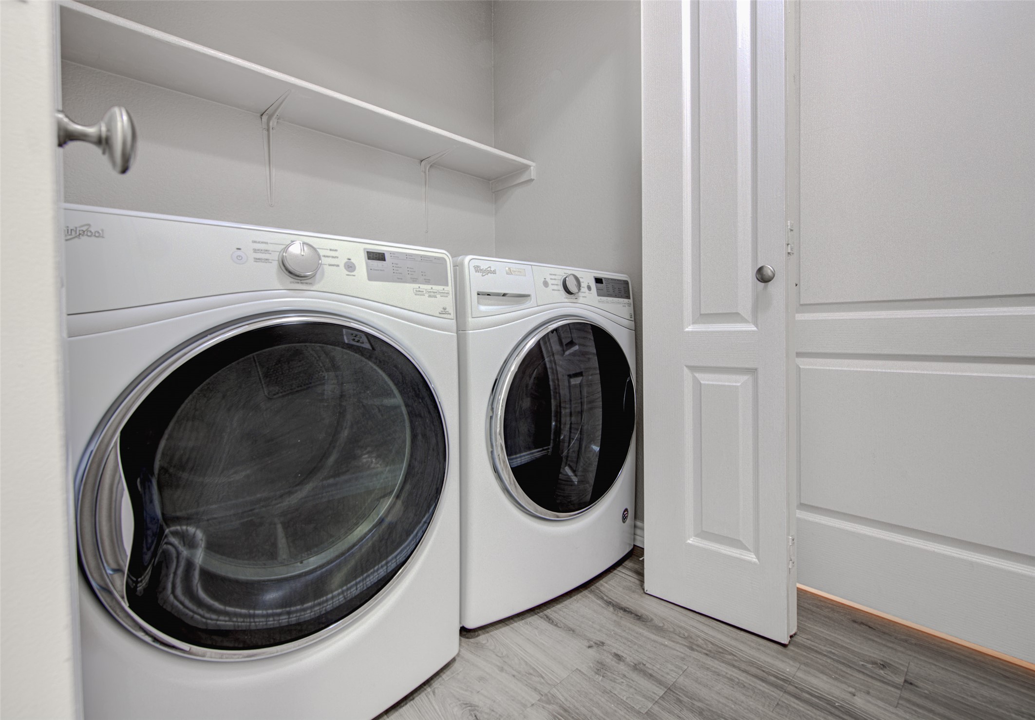 6709 Doyal Drive Austin, TX 78747 - Photo 16 of 22 Laundry area with washer and clothes dryer